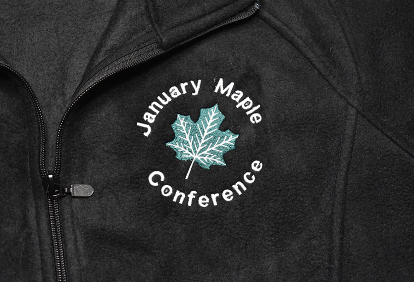 january maple conference black jacket closeup